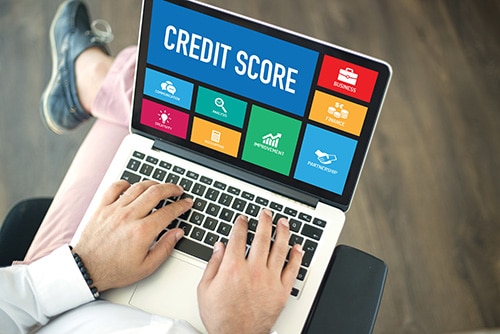 laptop showing credit score