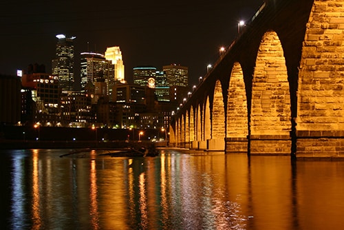 Stone arch bridge in Minneapolis at night